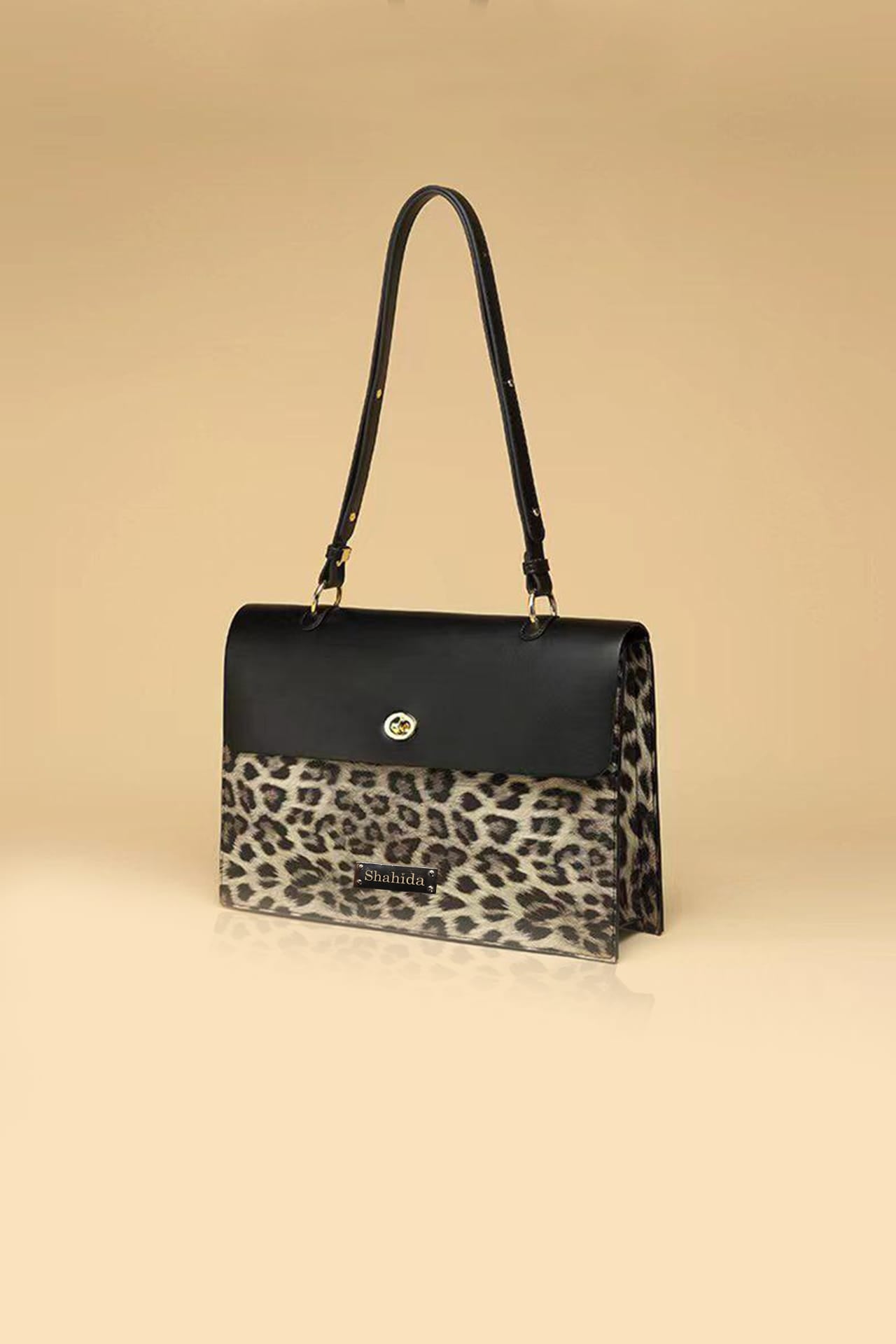 Versona | printed faux leather satchel and wallet set