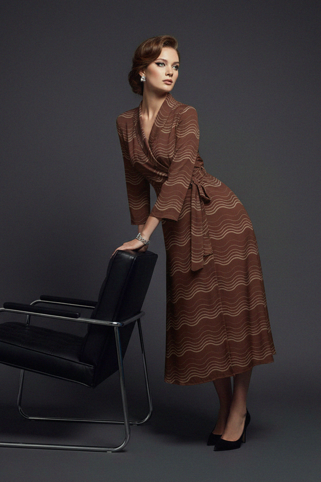 silk wrap, patterned robe, wavy stripes, minimalist shoot, chic styling, soft drape, fashion feature