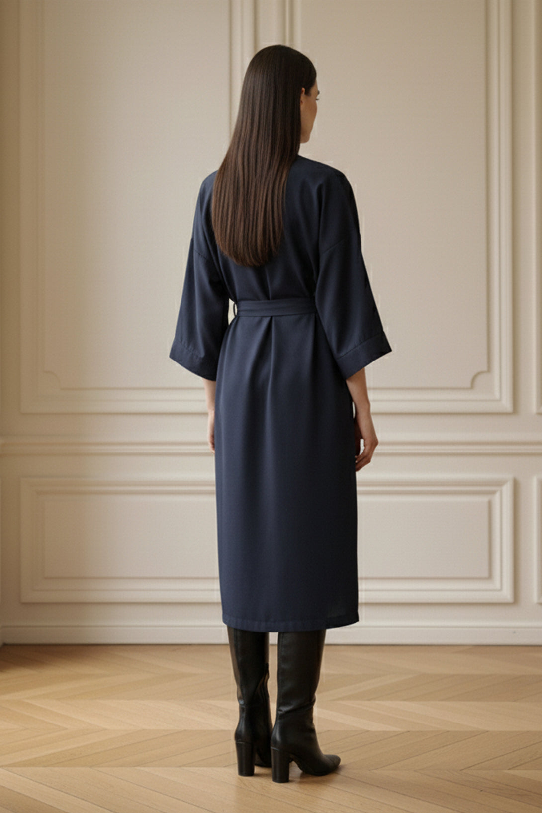 back facing pose, elegant navy dress, chic wrap outfit, belted midi style, kimono sleeve detail